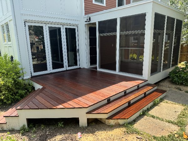 Mahogany deck with a mitred picture-frame border and cascading steps